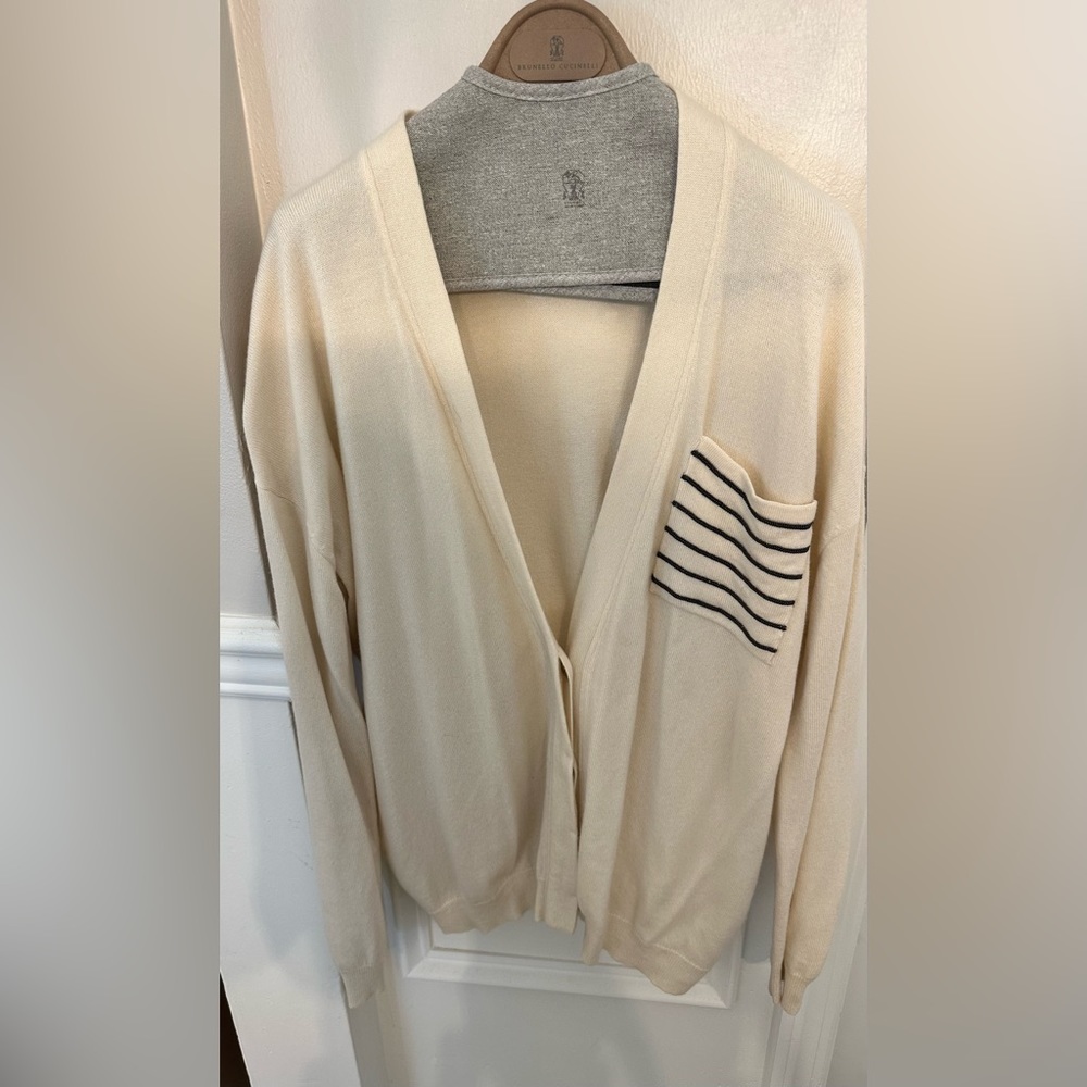 Brunello Cucinelli beige cardigan with monili on the left packet. 100% cashmere